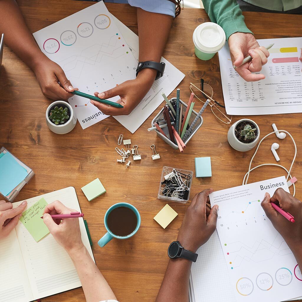 Busy team working at table